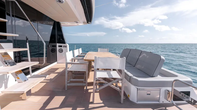 Slide: The Image of Luxurious 2024 Pardo Yachts E60 deck with seating and ocean view. - 43