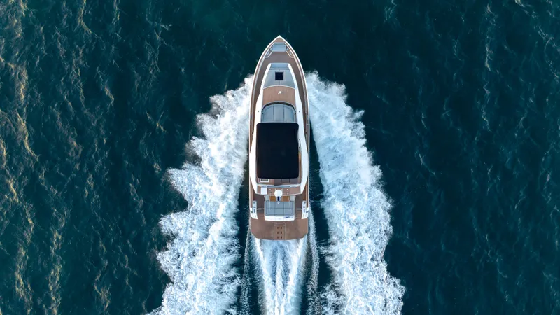 Slide: The Image of Aerial view of 2024 Pardo Yachts E60 cruising on open water. - 17