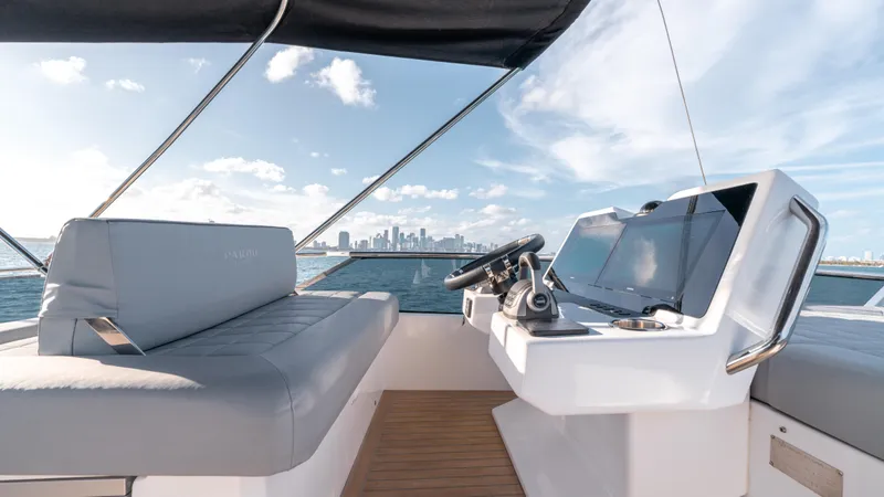 Slide: The Image of 2024 Pardo Yachts E60 helm with city skyline view, modern design. - 20