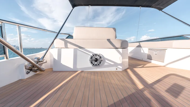 Slide: The Image of 2024 Pardo Yachts E60 deck with seating, ocean view, and clear sky. - 29