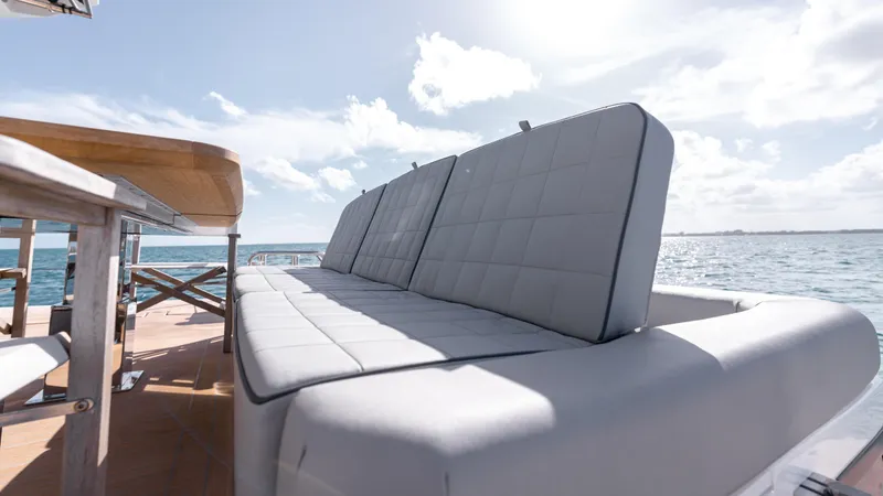 Slide: The Image of 2024 Pardo Yachts E60 deck with luxurious seating and ocean view. - 46