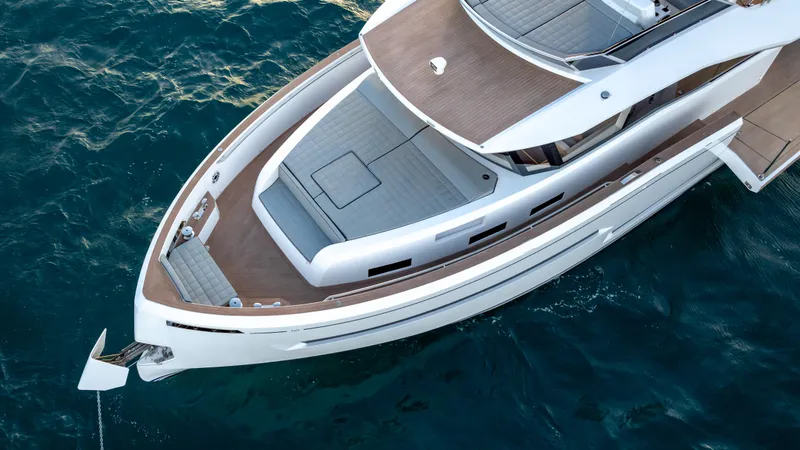 Slide: The Image of 2024 Pardo Yachts E60 luxury yacht on blue ocean water. - 8