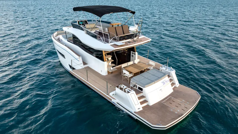 Slide: The Image of 2024 Pardo Yachts E60 luxury yacht cruising on open water. - 9