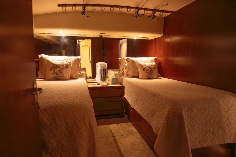 Slide: The Image of Cozy twin bedroom interior on 1990 Hatteras 58 Convertible yacht. - 38