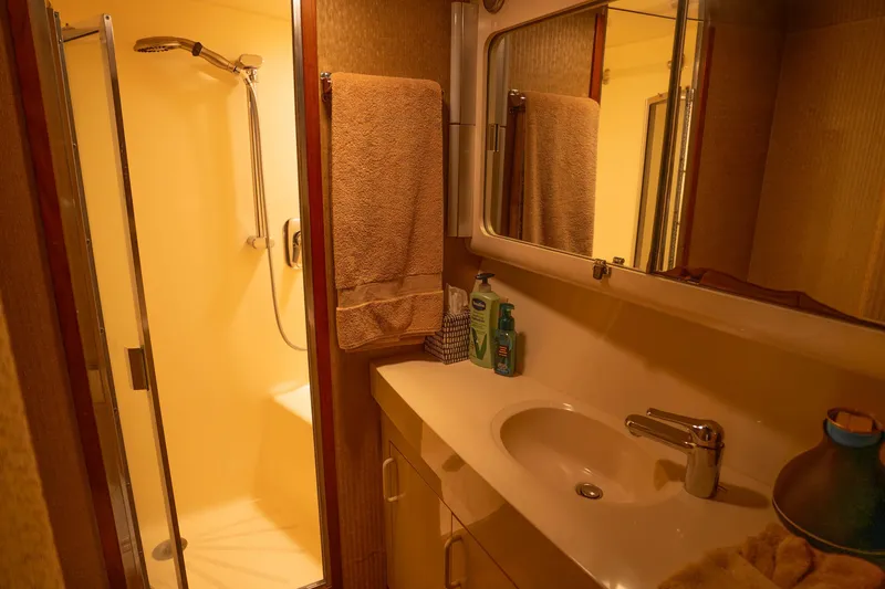 Slide: The Image of Bathroom interior of 1990 Hatteras 58 Convertible yacht with shower and sink. - 39