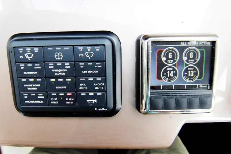 Slide: The Image of Control panel of a 2020 Galeon 550 Fly yacht, featuring navigation and engine controls. - 19