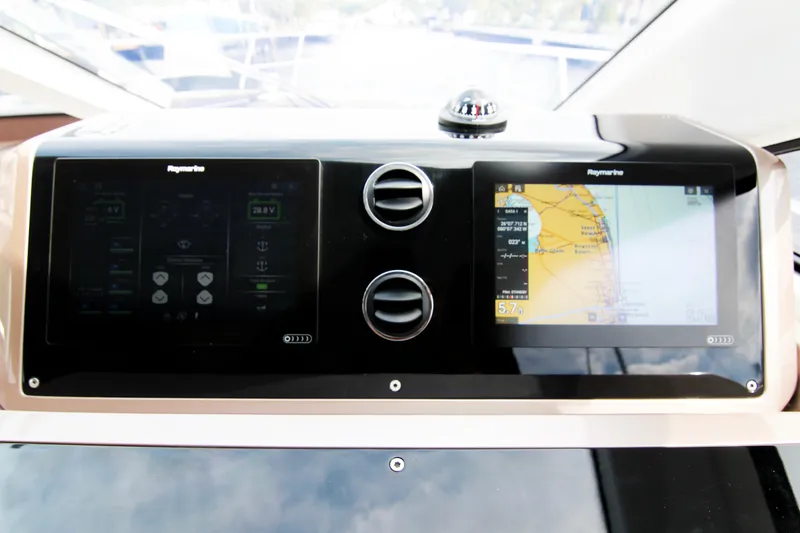 Slide: The Image of Dashboard of 2020 Galeon 550 Fly yacht with dual Raymarine displays. - 22