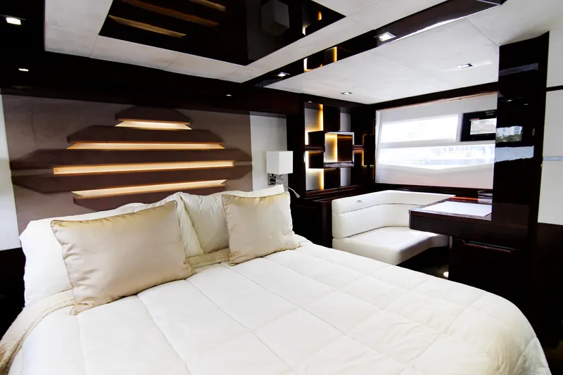 Slide: The Image of Luxurious interior of 2020 Galeon 550 Fly yacht with modern design and cozy bedding. - 27