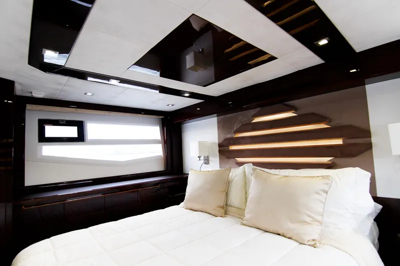 Slide: The Image of Luxurious bedroom interior of 2020 Galeon 550 Fly yacht with modern design elements. - 28