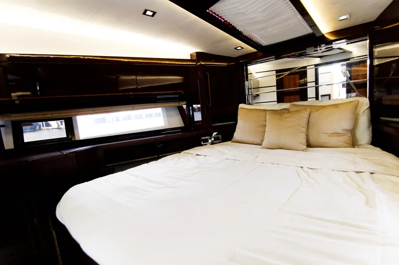 Slide: The Image of Luxurious bedroom interior of 2020 Galeon 550 Fly yacht with elegant bedding and modern design. - 31