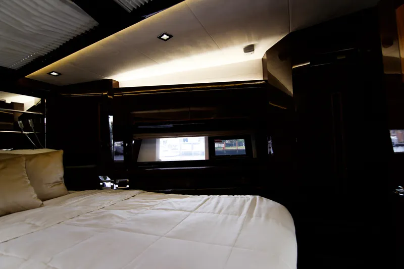 Slide: The Image of Luxurious interior of 2020 Galeon 550 Fly yacht bedroom with modern lighting. - 34
