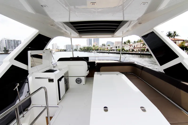 Slide: The Image of Luxurious 2020 Galeon 550 Fly yacht interior with modern amenities and waterfront view. - 43