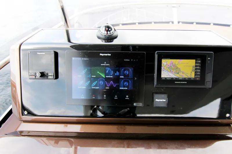 Slide: The Image of Control panel of 2020 Galeon 550 Fly yacht with navigation displays. - 46