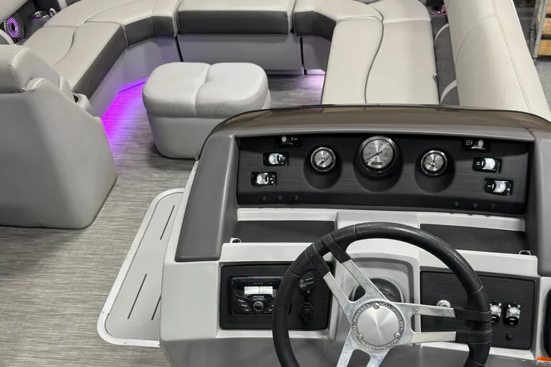 Slide: The Image of 2020 Bennington SXP 23 SSBXP boat interior with modern dashboard and seating. - 17