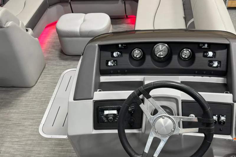 Slide: The Image of Interior view of 2020 Bennington SXP 23 SSBXP boat with steering wheel and dashboard. - 19