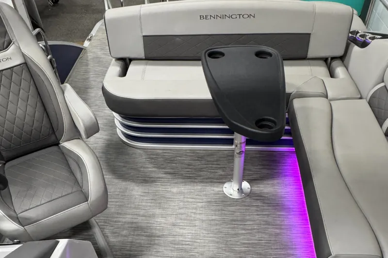 Slide: The Image of Luxurious interior of 2020 Bennington SXP 23 SSBXP pontoon boat with stylish seating and table. - 23