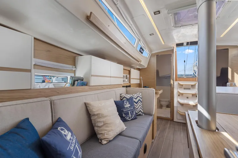 Slide: The Image of Luxurious interior of 2017 Elan E4 yacht with modern design and comfortable seating. - 14