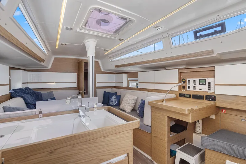 Slide: The Image of Modern interior of 2017 Elan E4 yacht with sleek design and comfortable seating. - 15