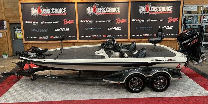 The Image of 2018 Ranger Z521C fishing boat on display with Mercury engine. - 1
