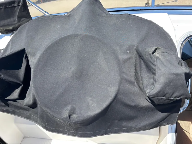 Slide: The Image of Black cover on Bayliner 4700 boat dashboard, 1994 model. - 3