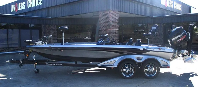 Slide: The Image of 2018 Ranger Z520C fishing boat parked outside Angler's Choice store. - 1