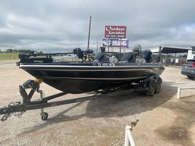 Slide: The Image of 2016 Ranger 522D boat on trailer at Outdoor Specialties dealership. - 3