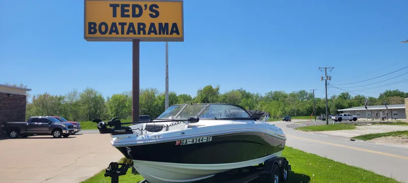 Slide: The Image of 2021 Bass Tracker TAHOE 550TF boat displayed at Ted's Boatarama dealership. - 2