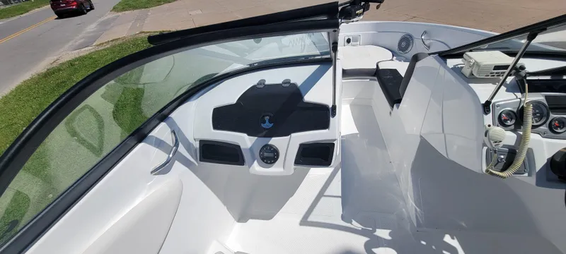 Slide: The Image of 2021 Bass Tracker TAHOE 550TF boat interior with steering wheel and dashboard. - 36