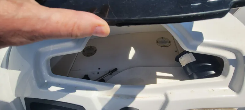 Slide: The Image of Open storage compartment in 2021 Bass Tracker TAHOE 550TF boat. - 37