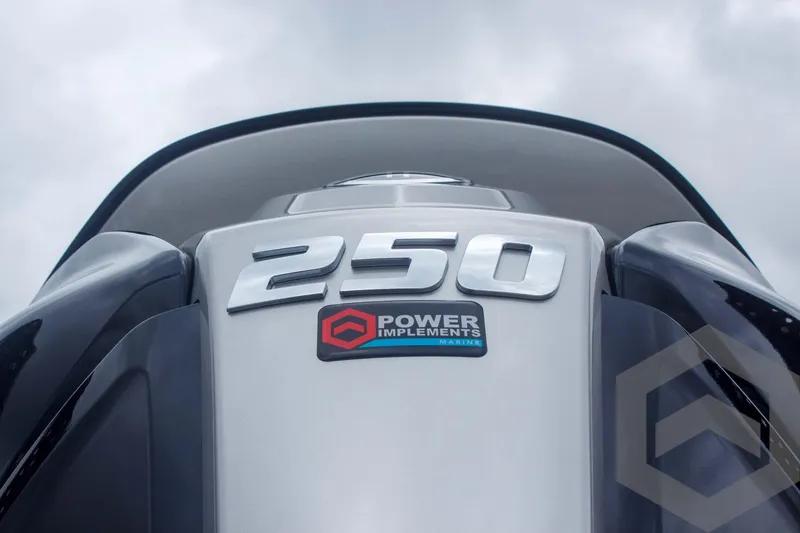 Slide: The Image of 2025 Caymas CX 21 PRO boat engine with "250" and "Power Implements" branding. - 12