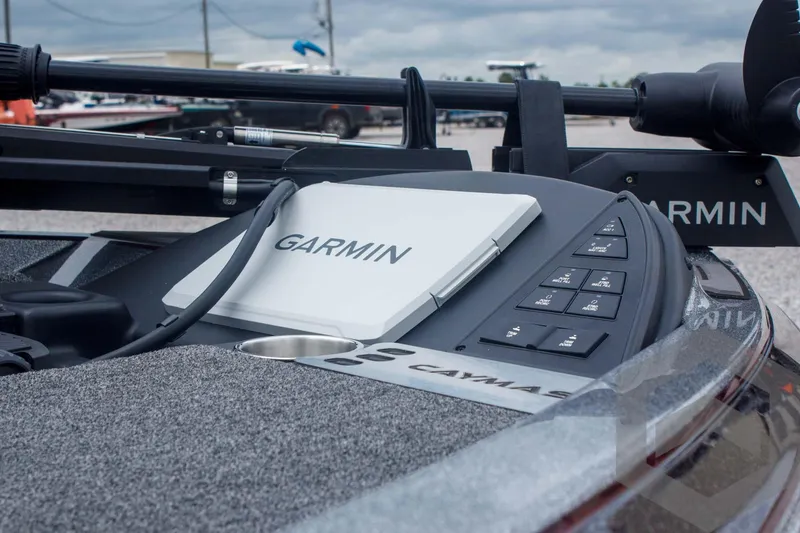 Slide: The Image of 2025 Caymas CX 21 PRO boat dashboard with Garmin navigation system. - 17