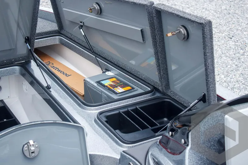 Slide: The Image of 2025 Caymas CX 21 PRO boat storage compartments with organized interior layout. - 28
