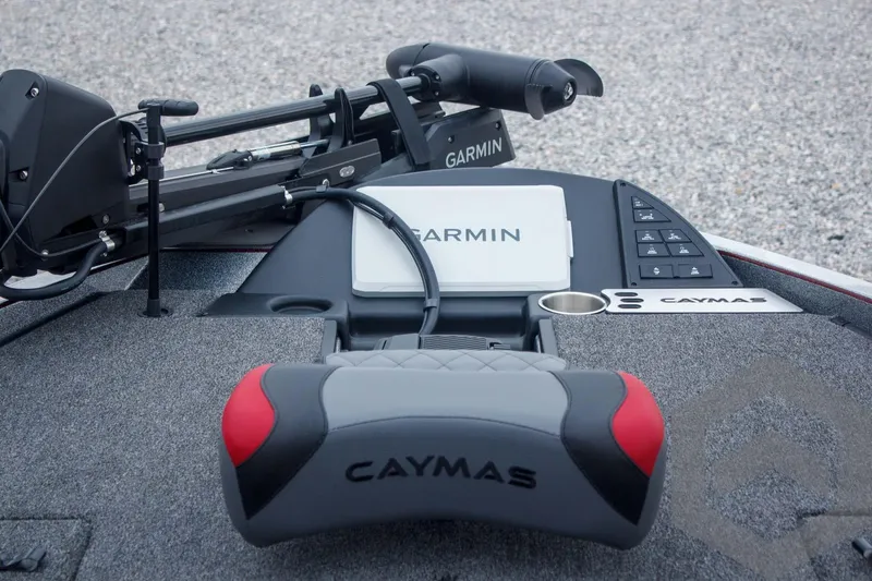 Slide: The Image of 2025 Caymas CX 21 PRO boat dashboard with Garmin electronics and controls. - 29