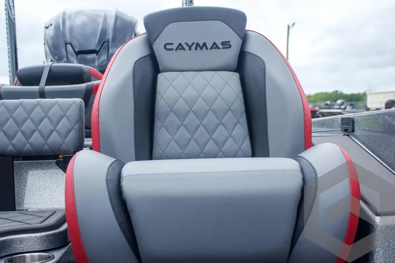 Slide: The Image of 2025 Caymas CX 21 PRO boat seat with gray and red upholstery, featuring diamond stitching. - 33
