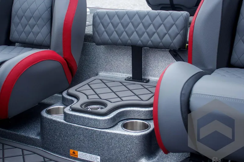 Slide: The Image of 2025 Caymas CX 21 PRO interior seating with cup holders and quilted upholstery. - 36