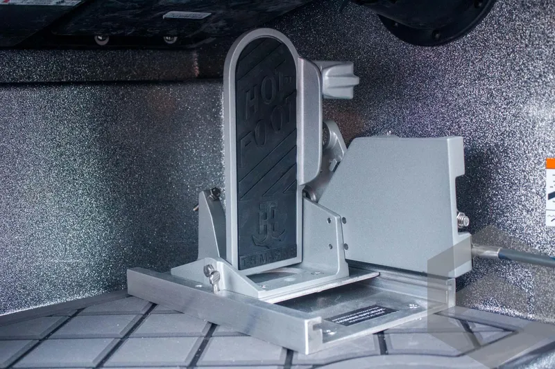 Slide: The Image of 2025 Caymas CX 21 PRO boat compartment with Hot Foot throttle control. - 42