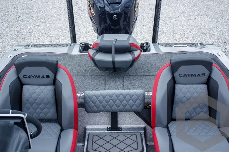 Slide: The Image of 2025 Caymas CX 21 PRO boat interior with gray and red seating, diamond stitching. - 43