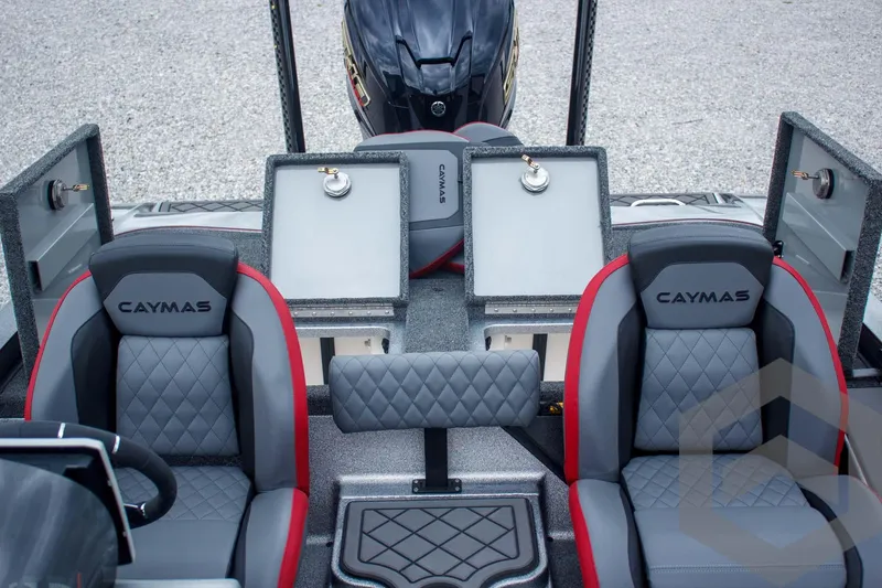 Slide: The Image of 2025 Caymas CX 21 PRO boat interior with dual seats and storage compartments. - 44