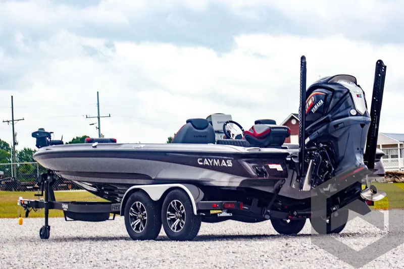 Slide: The Image of 2025 Caymas CX 21 PRO boat on trailer, featuring sleek design and powerful engine. - 7