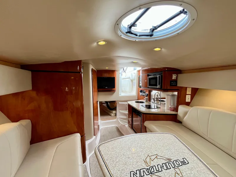 Slide: The Image of Luxurious interior of 2011 Fountain 38 Sportfish Cruiser with modern amenities and elegant design. - 26