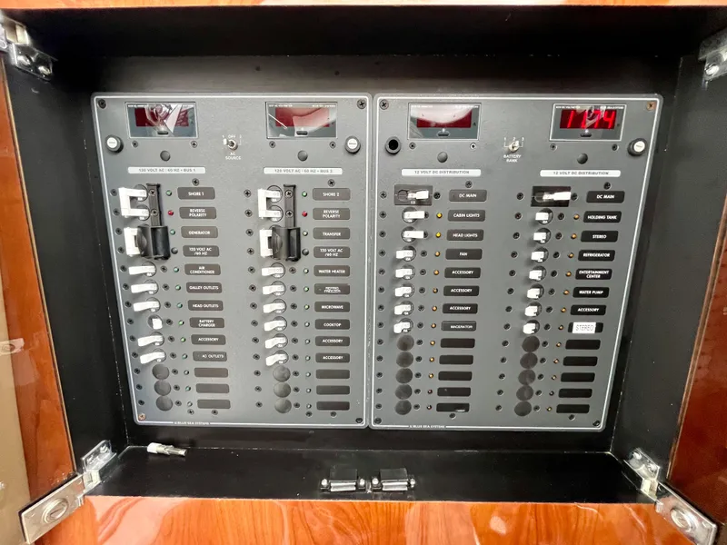 Slide: The Image of Electrical control panel on a 2011 Fountain 38 Sportfish Cruiser boat. - 41