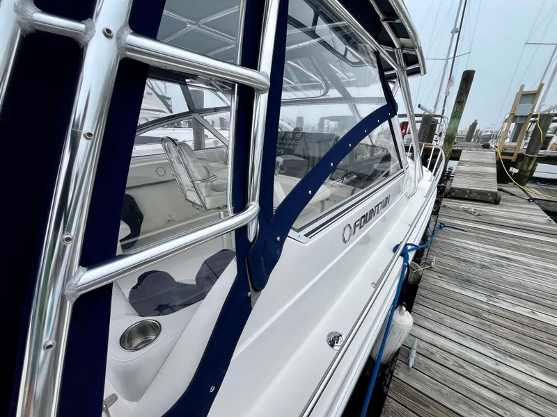 Slide: The Image of 2011 Fountain 38 Sportfish Cruiser docked, showcasing sleek design and modern features. - 45