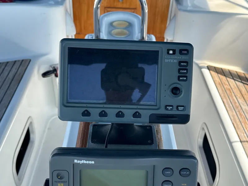 Slide: The Image of Cockpit navigation instruments on a 1997 Beneteau 50 sailboat. - 18