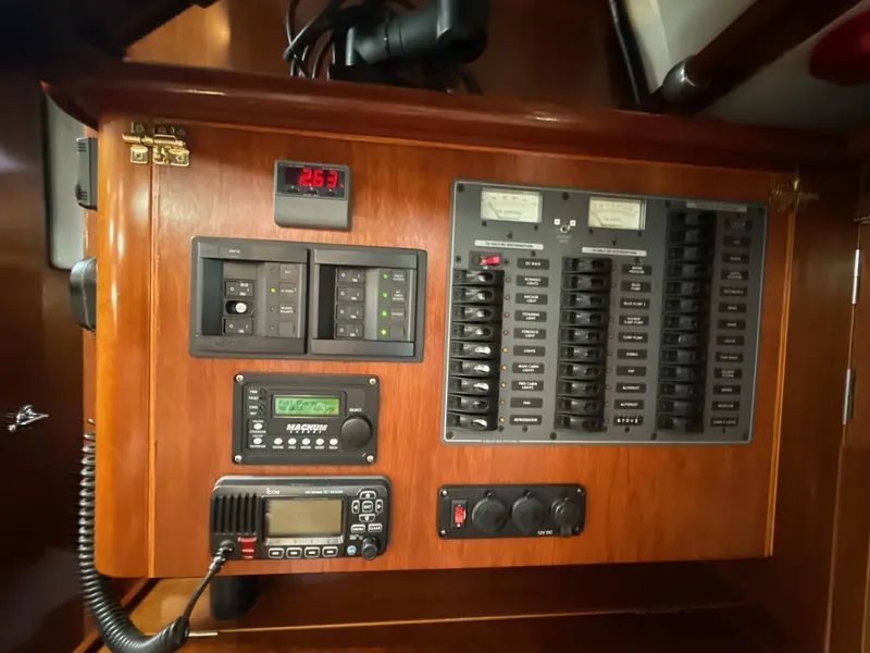 Slide: The Image of Electrical control panel on a 1997 Beneteau 50 yacht, featuring switches and meters. - 6