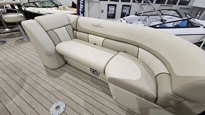 Slide: The Image of Luxurious seating on 2019 SunChaser Eclipse 8525 Entertainer boat, featuring beige upholstery. - 17