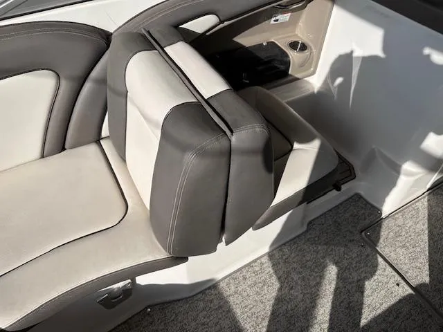 Slide: The Image of 2012 Yamaha Boats 242 Limited S interior seating with gray and white upholstery. - 15