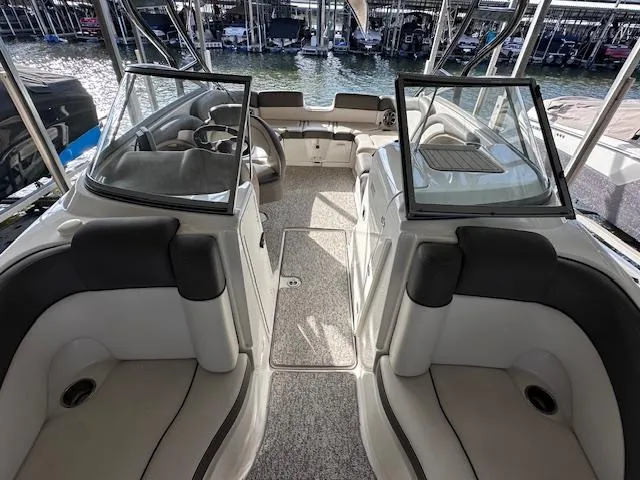 Slide: The Image of 2012 Yamaha Boats 242 Limited S interior with seating and open deck view. - 18
