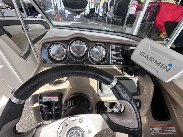 Slide: The Image of 2012 Yamaha Boats 242 Limited S dashboard with Garmin navigation system. - 20
