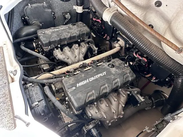 Slide: The Image of 2012 Yamaha Boats 242 Limited S engine compartment with dual high output engines. - 29