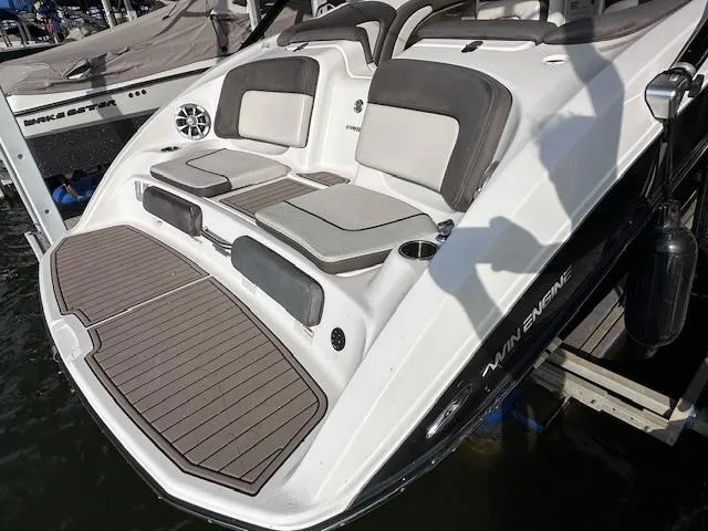 Slide: The Image of 2012 Yamaha Boats 242 Limited S with cushioned seating and swim platform. - 6